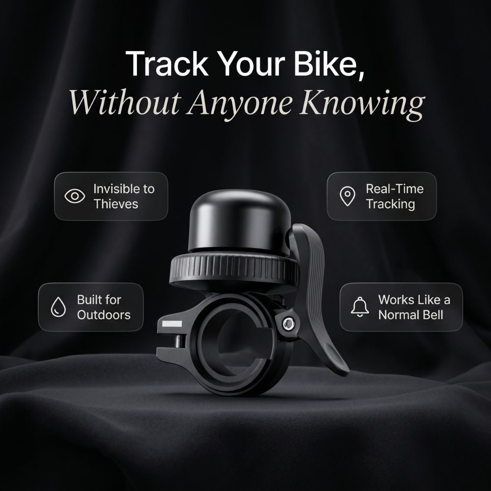 Black bike bell with features highlighted on a dark background