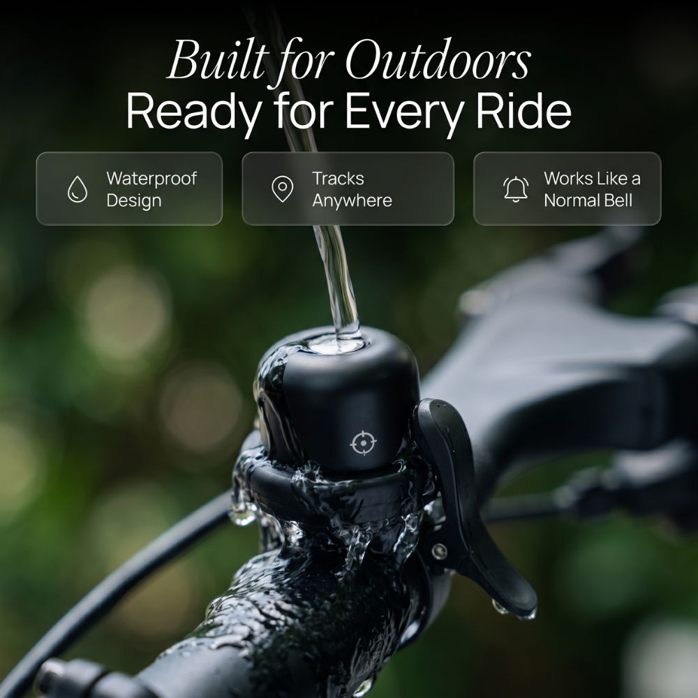 Bicycle handlebar with bell, water droplets, and outdoor text overlay